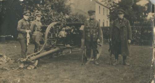 Grand Hotel, Omeath, county Louth. Caption on reverse reads -Turlough McNeill- 18 Pounder at Grand Hotel, Omeath, Co. Louth, August 1922. (Turlough not in photo). Featuring Lieutenant Tim Coughlan (second from left). (Reference: IE/MA/PC/0014 (11))
